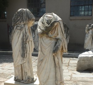 Headless togate statues in the courtyard of the Corinth museum